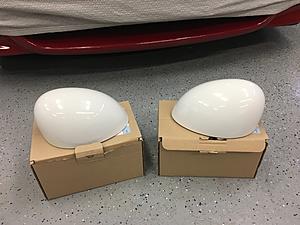White mirror caps.-1afdc725-3878-4c6f-ba9d-b5553368f11d.jpeg