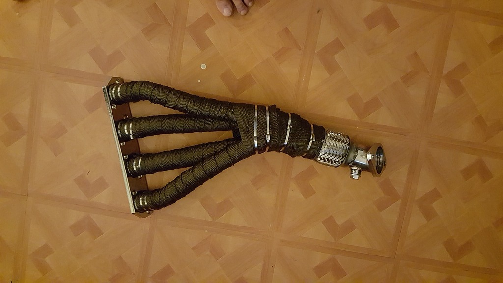 Name: exhaust%20headers%20wrapped_1.jpg
Views: 539
Size: 124.4 KB
