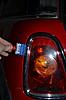 R56 rear cluster light bulbs-taillight-chrome-prying-out.jpg