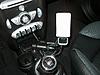 Anyone have a ipod holder instead of laying down near the cup holders?  If so,pics-ipod-mount.jpg