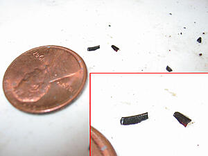 Pulled plug #2, soaked in oil and metal bits...-5hfoe.jpg